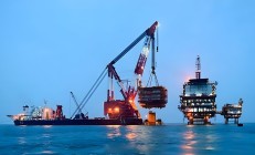 国际油价飙升 中国油服设备“出海”被看好